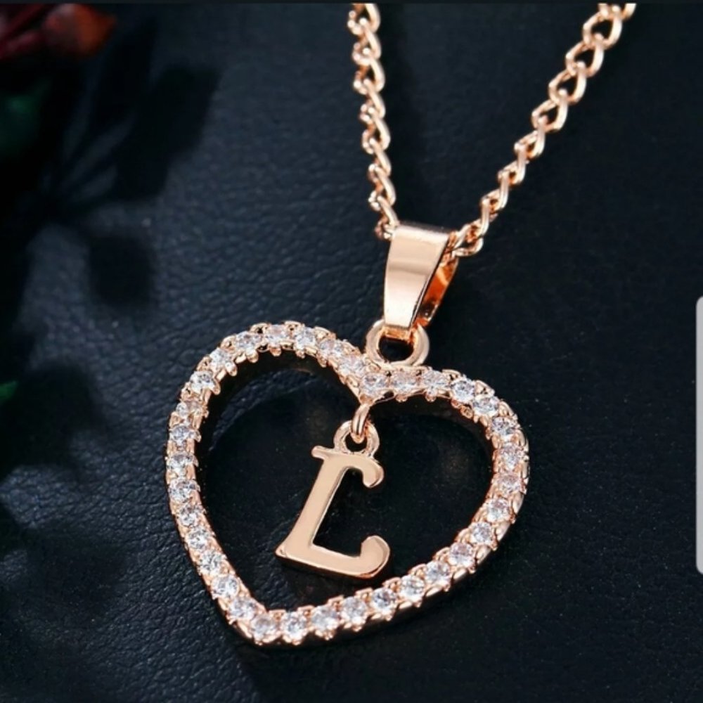 New gold tone letter L necklace